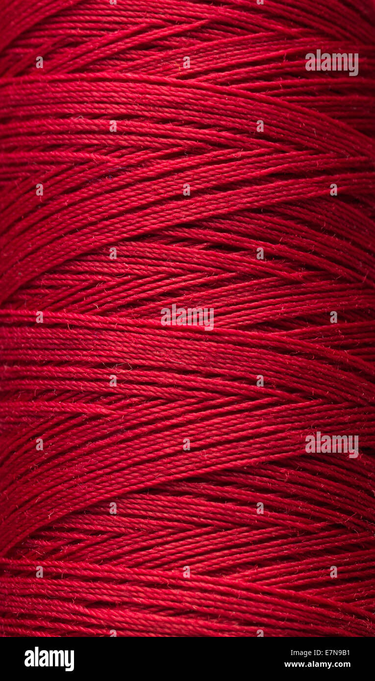 macro red cotton thread Stock Photo