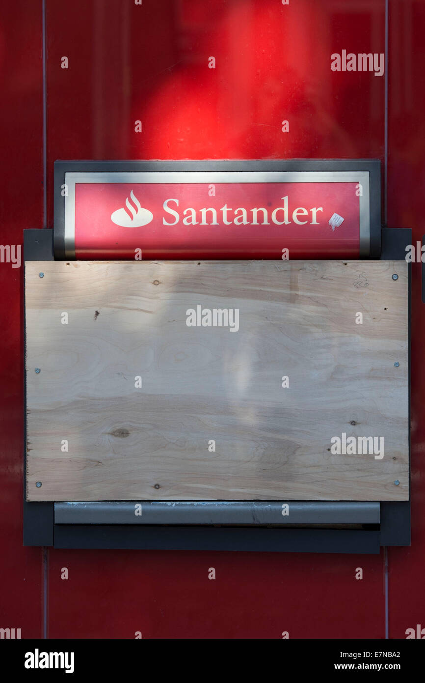 A boarded up Santander cashpoint ATM that was used in a fraud card skimming attack. Stock Photo