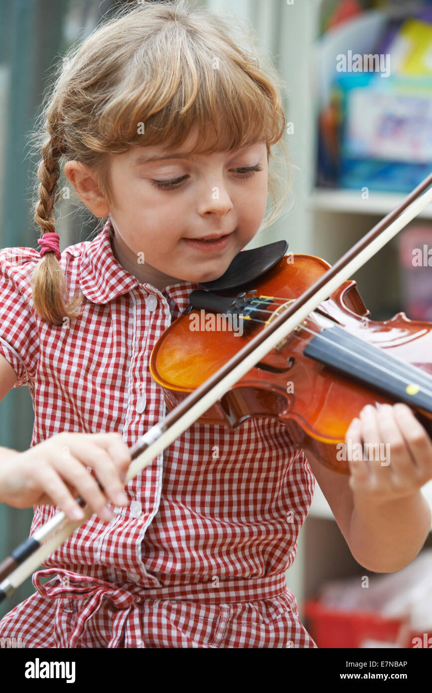 Girl violin school uniform hi-res stock photography and images - Alamy