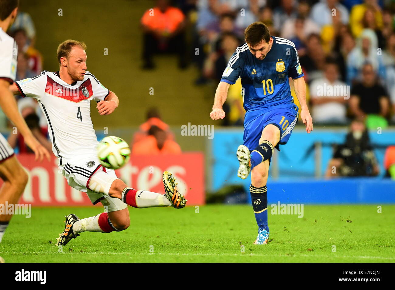 Benedikt HOEWEDES and Lionel Messi. Argentina v Germany. Final. FIFA World Cup 2014 Brazil. Maracana Stadium, Rio. 13 July 2014. Stock Photo