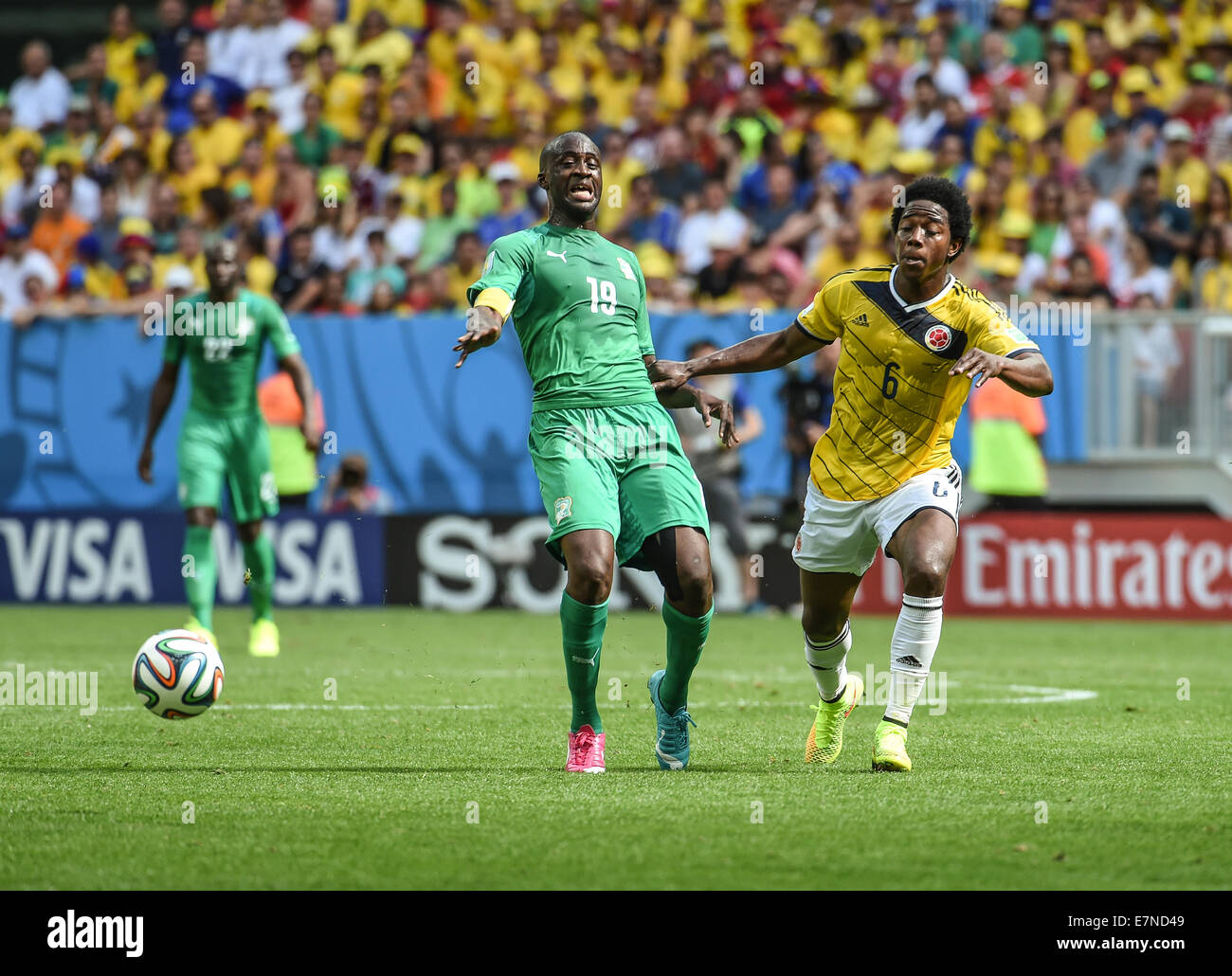 Yaya Toure and Carlos Sanchez. Colombia v Ivory Coast. Group match. FIFA World Cup 2014 Brazil. National stadium, Brasilia. 19 J Stock Photo