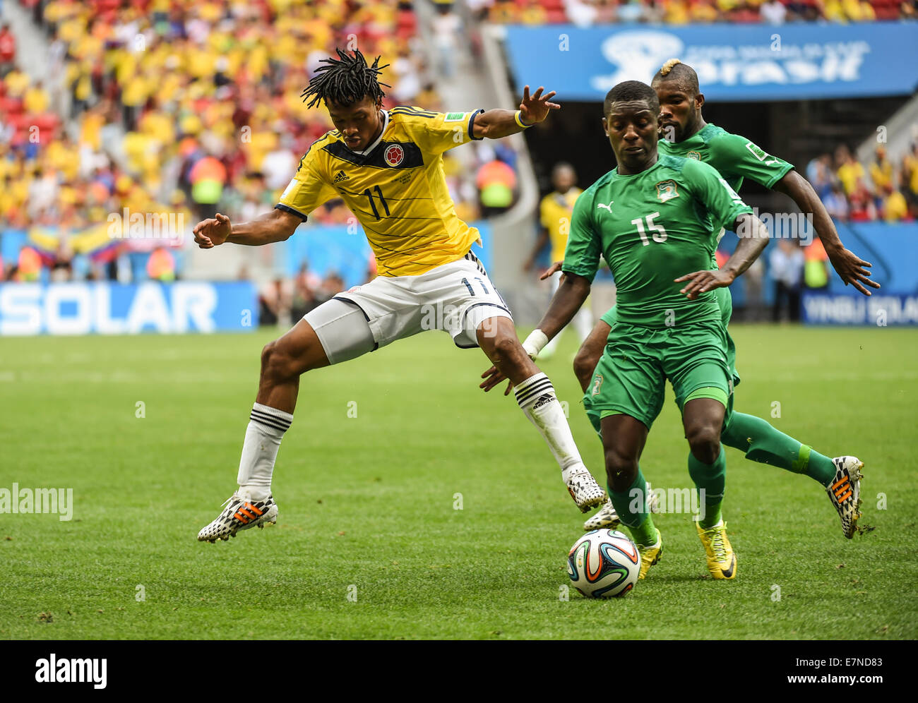 Juan Cuadrado and Max Gradel. Colombia v Ivory Coast. Group match. FIFA World Cup 2014 Brazil. National stadium, Brasilia. 19 Ju Stock Photo
