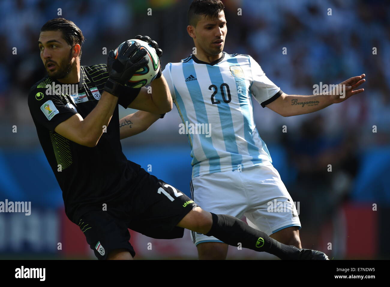 Alireza Haghighi and Sergio Aguero. Argentina v Iran. FIFA World Cup 2014 Brazil. Mineirao stadium, Belo Horizonte. 21 June 2014 Stock Photo