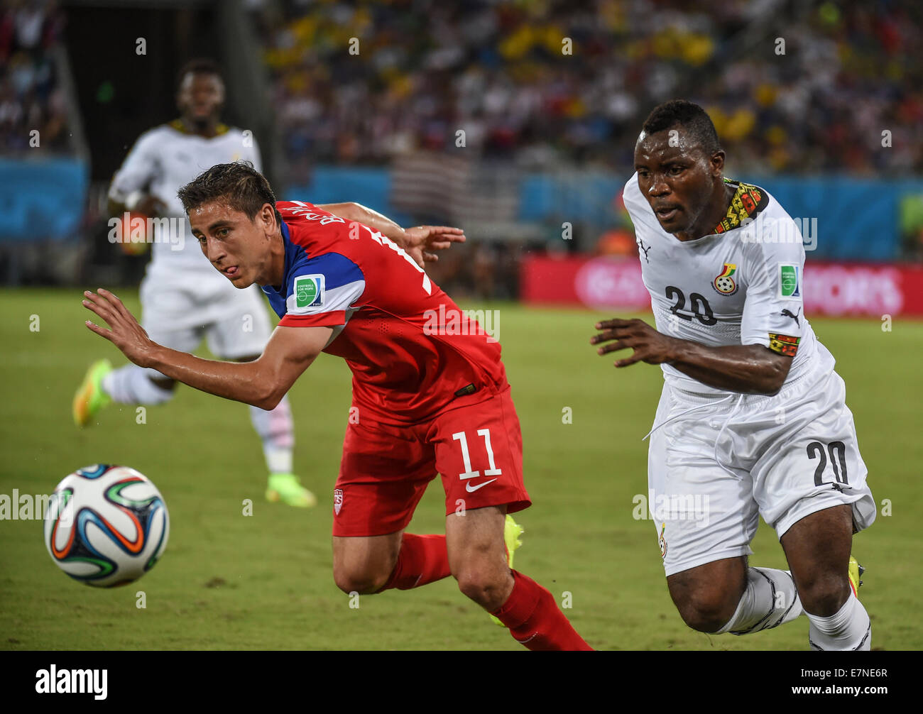 Alejandro Bedoya of USA and Kwadwo Asamoah of Ghana. Ghana v USA FIFA World Cup 2014. Natal, Brazil. 16 June 2014 Stock Photo