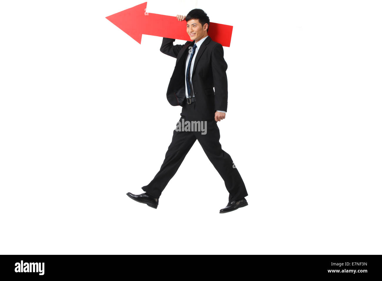 Business man with a red arrow on his shoulder Stock Photo - Alamy