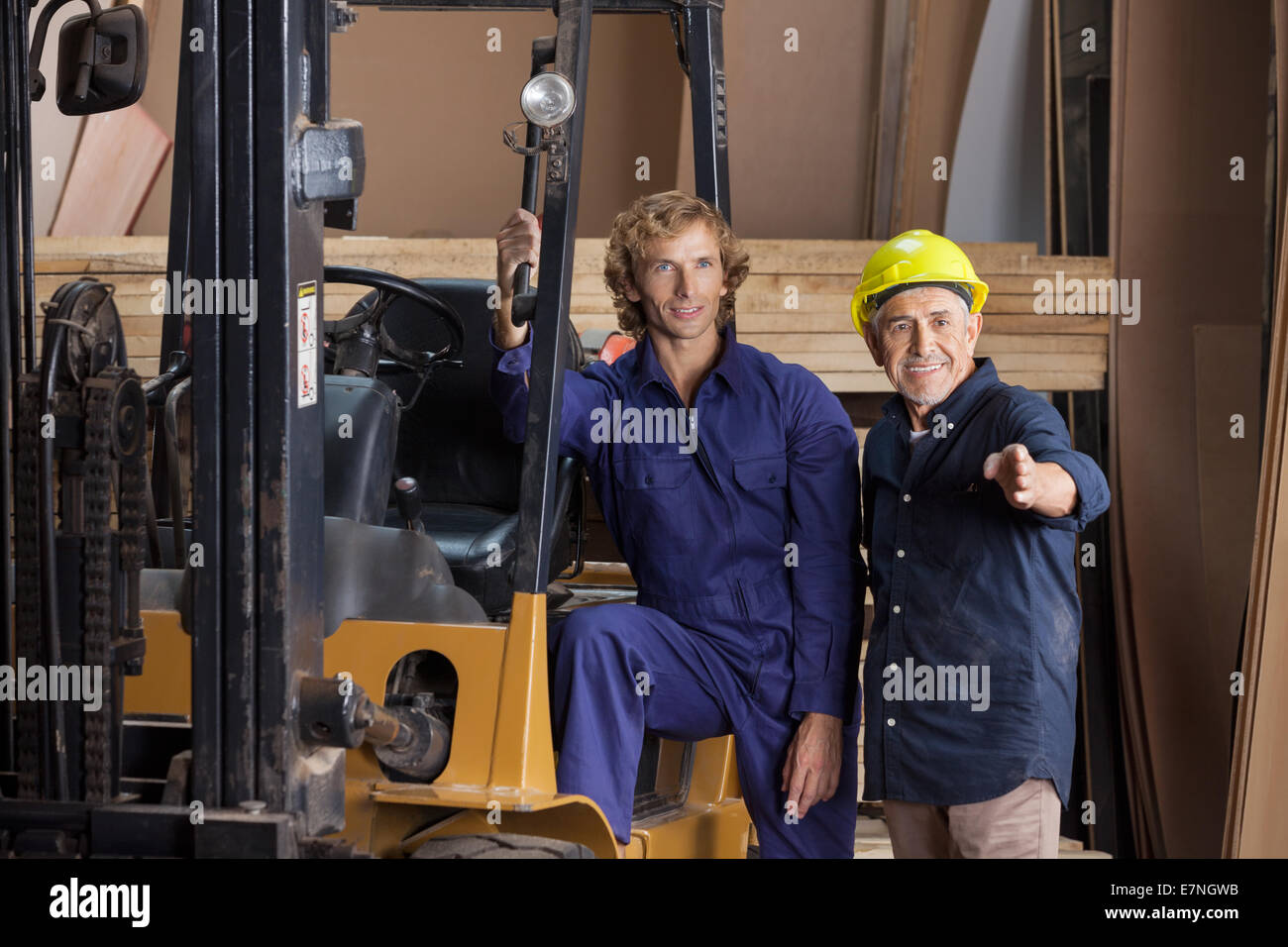 Carpenters Looking Away By Forktruck Stock Photo