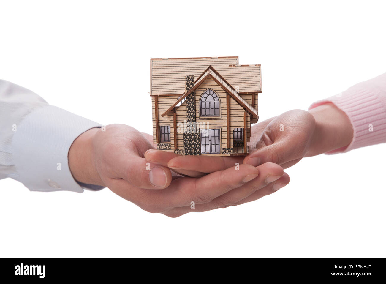 Hand holding house model Stock Photo - Alamy