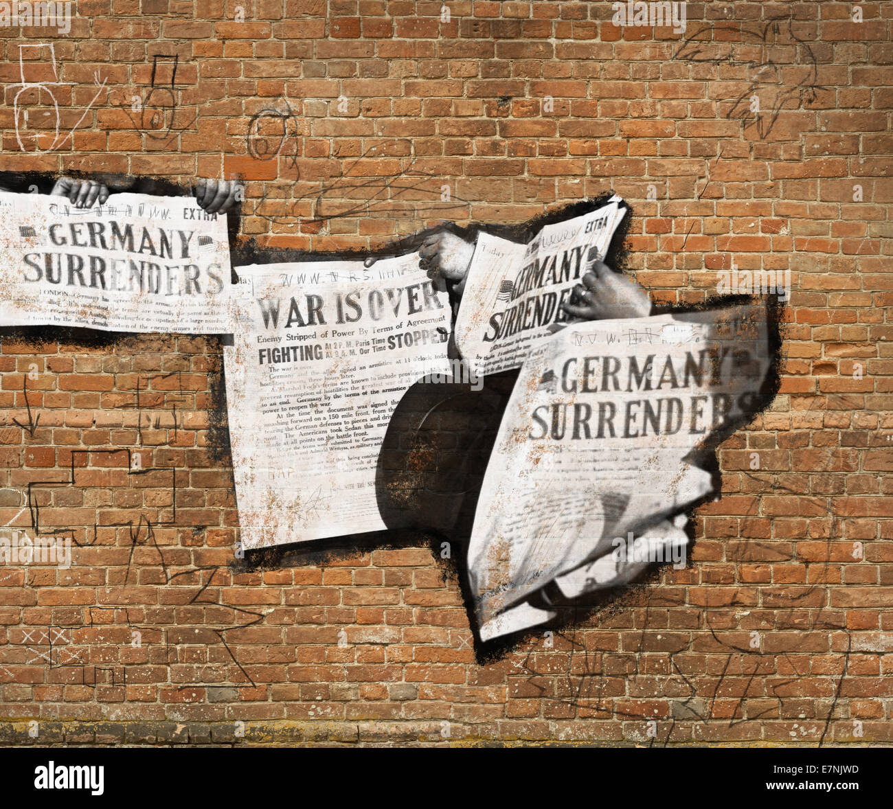 Image of newspapers on a brick wall with graffiti Stock Photo Alamy