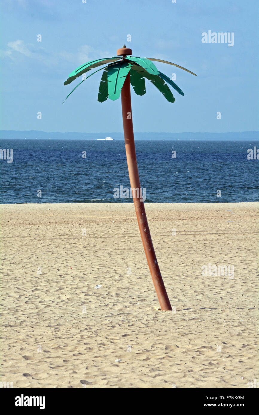 An artificial palm tree on the beach in Coney Island Brooklyn, New York