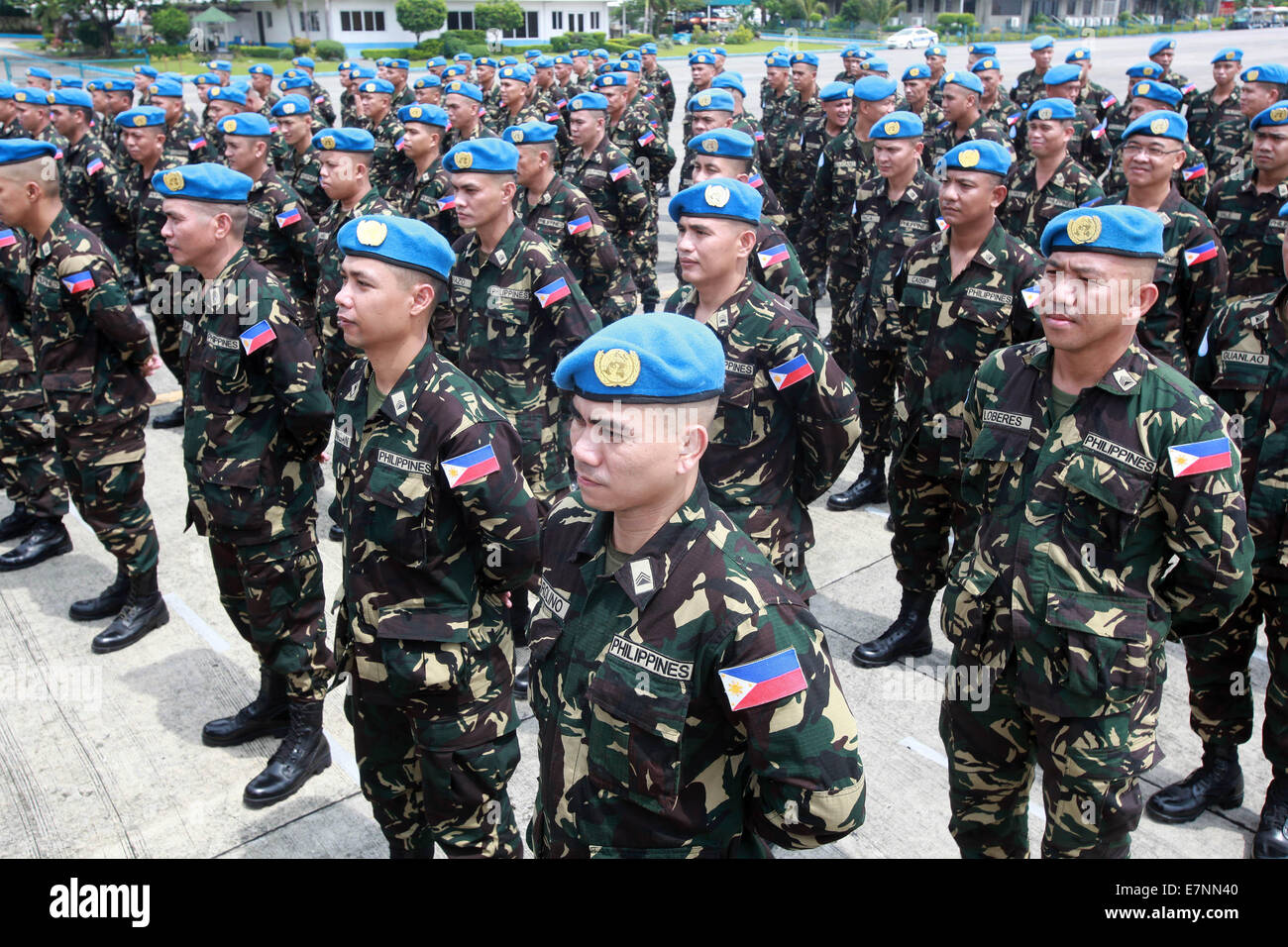 Pasay City, Philippines. 22nd Sep, 2014. Soldiers of Armed Forces of the Philippines (AFP) attend the send-off ceremony for the 18th AFP contingent to the United Nations Peace Keeping Force at the Villamor Air Base in Pasay City, the Philippines, Sept. 22, 2014. 157 soldiers will be assigned to Haiti for less than a year. Credit:  Rouelle Umali/Xinhua/Alamy Live News Stock Photo