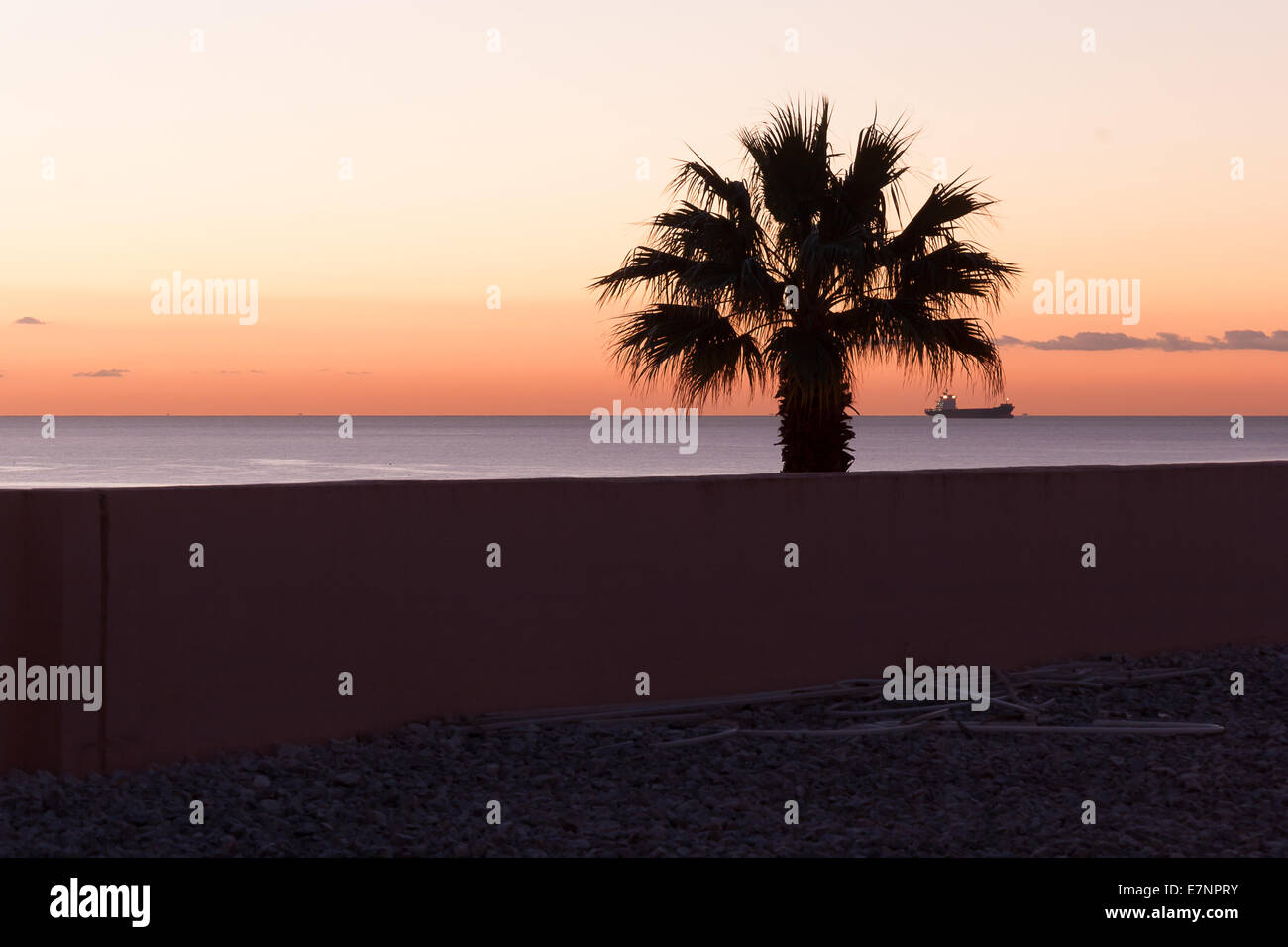 Sunset at Malaga beach Stock Photo - Alamy