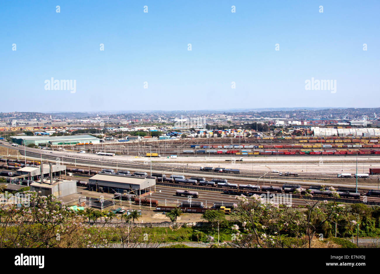 Bayhead road and railway tracks lead through heavy industrial and