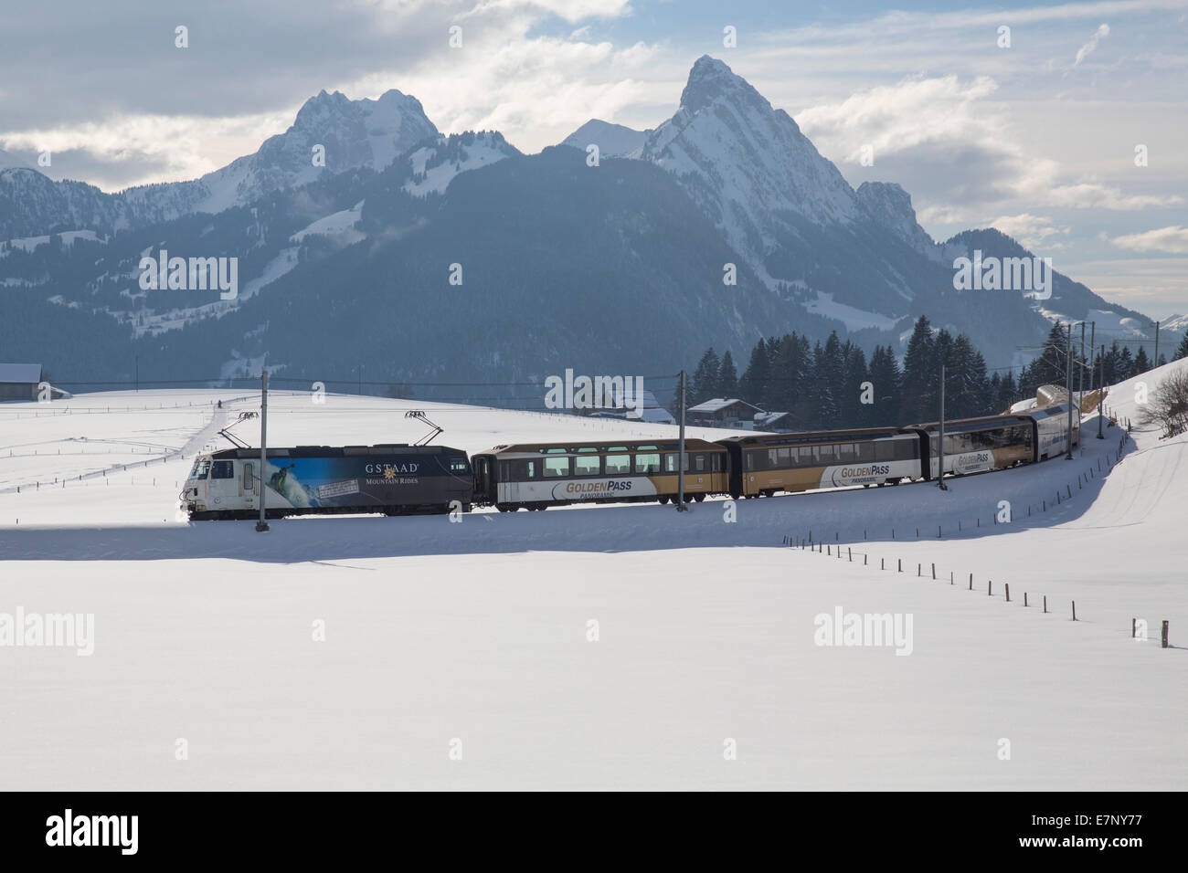 Saanenland, express train, Golden Pass, Schönried, mountain, mountains, winters, railway, train, railroad, canton Bern, Switzerl Stock Photo
