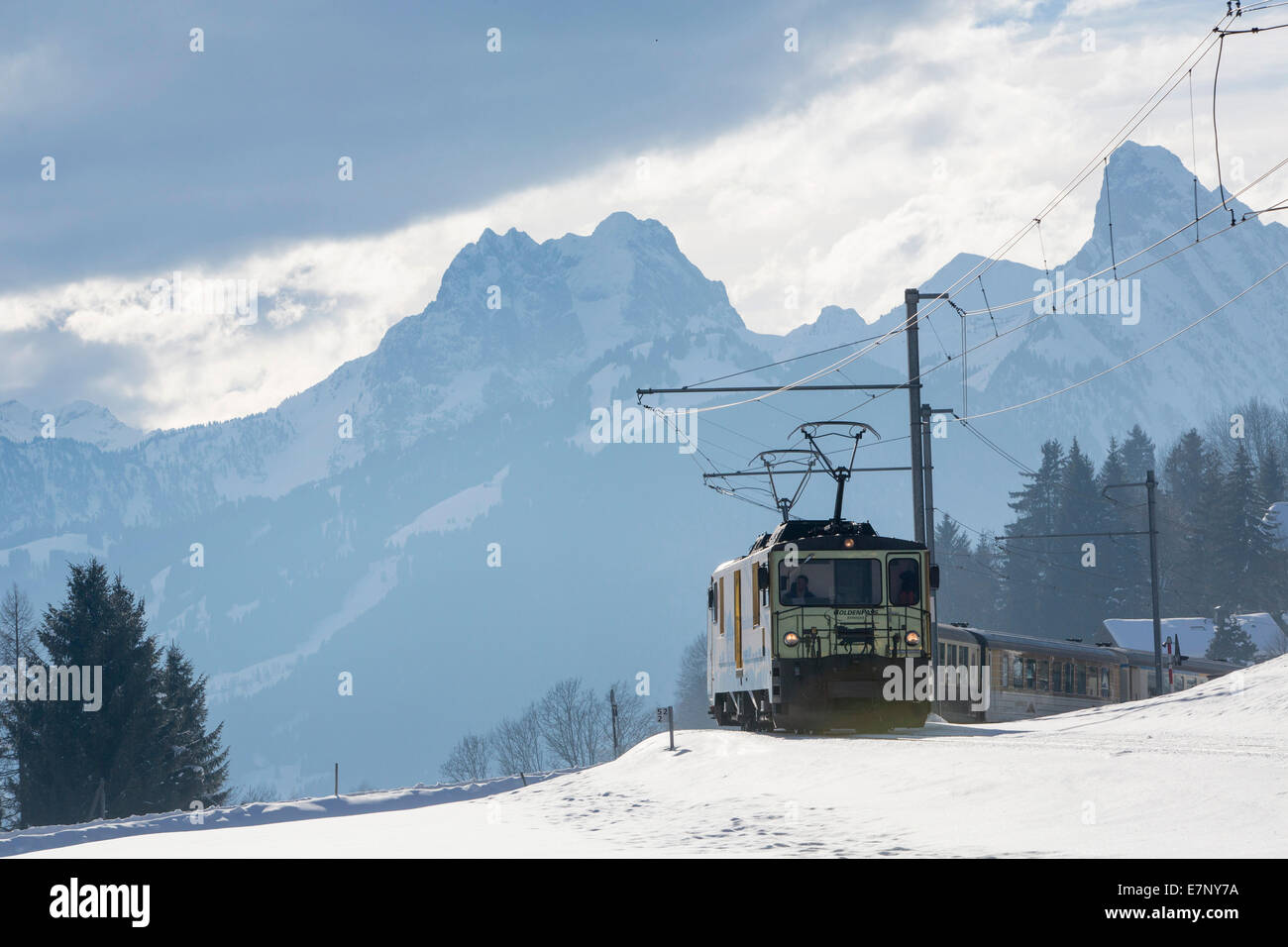 Saanenland, express train, Golden Pass, Saanenmöser, mountain, mountains, winters, railway, train, railroad, canton Bern, Switze Stock Photo