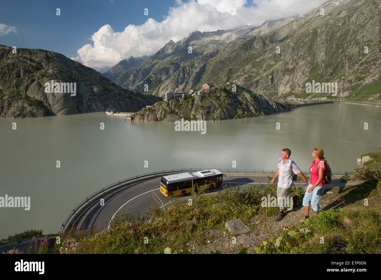 Postbus, hiker, lake Grimsel, walking, hiking, canton Bern, Switzerland, Europe, couple, man, woman, Stock Photo