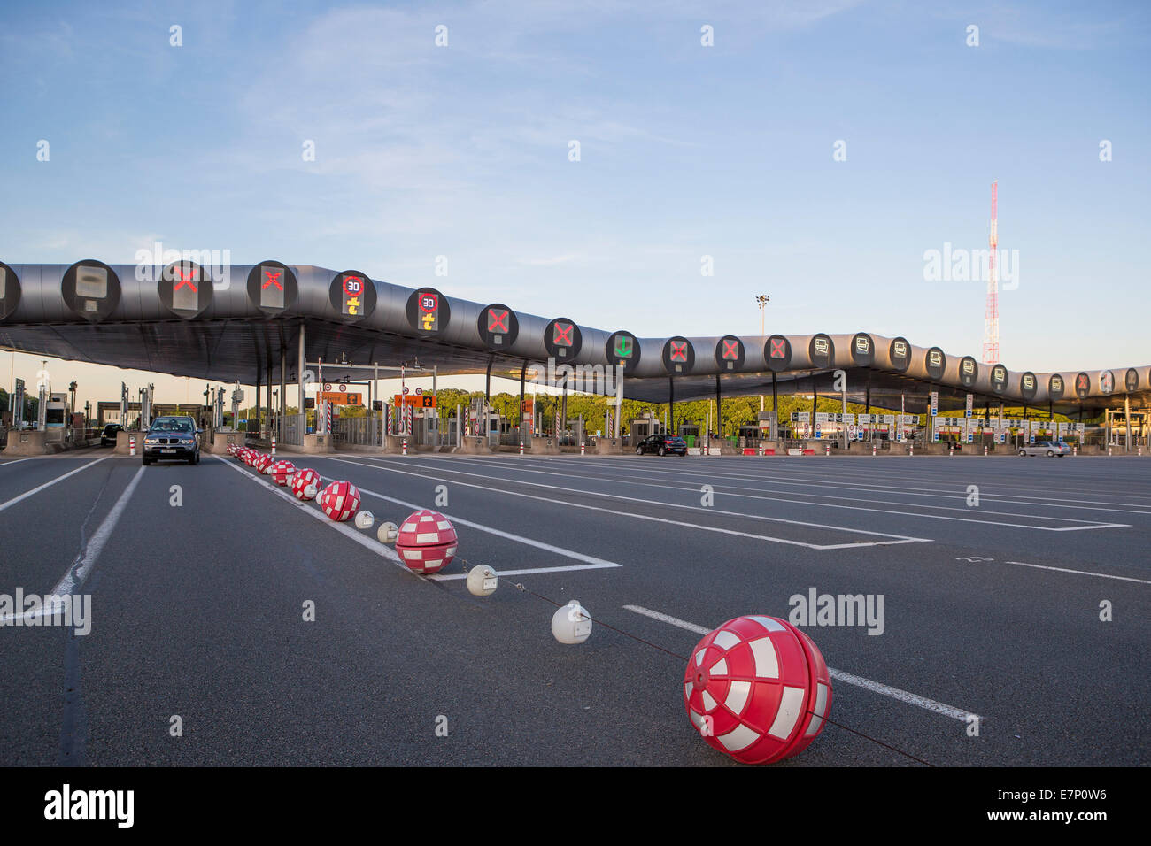 France, Europe, Paris, Versailles, city, expressway, gate, lanes, red, road, spring, toll, traffic, transit, transport, toll sta Stock Photo