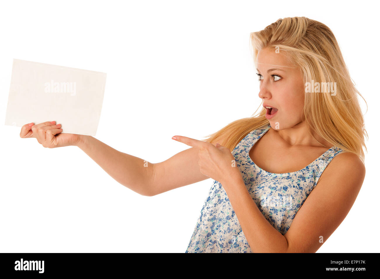 nde woman holding a blank white board in her hands for promotional text or banner isolated over white background Stock Photo