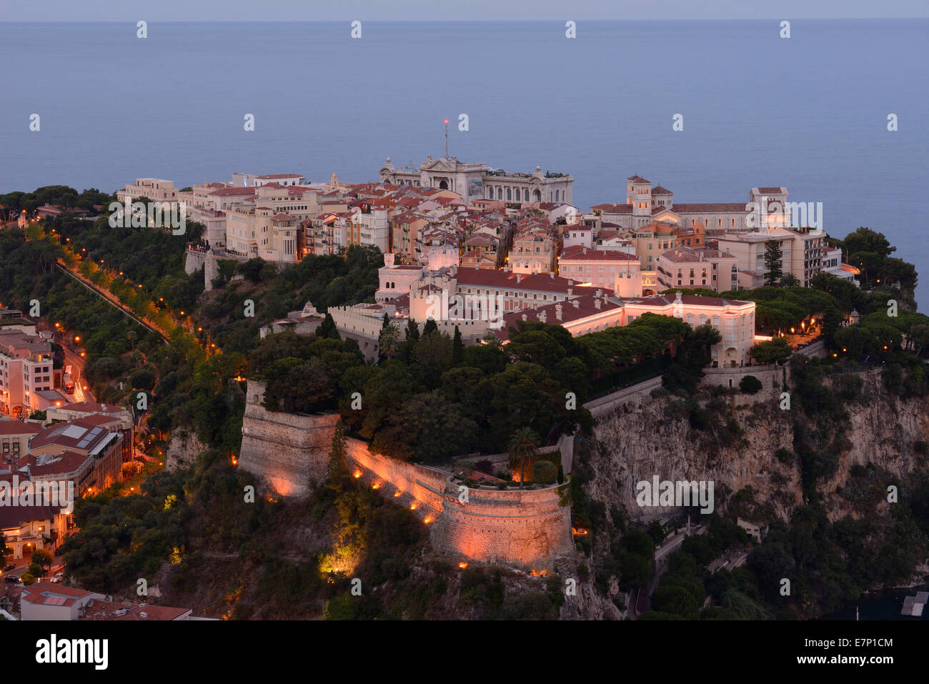 Prince's Palace of Monaco, Monte Carlo, Monaco, Cote d'Azur, Riviera, France, dusk, castle, sea, city Stock Photo