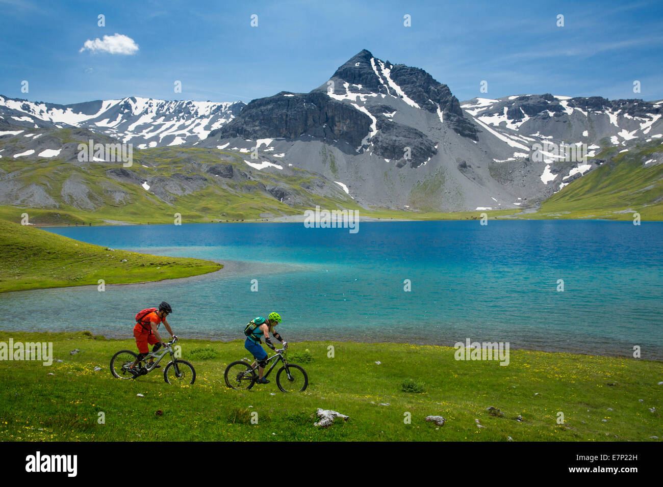 Münster valley, GR, mountain biker, Lai da Rims, Piz dal Lai, mountain, mountains, mountain lake, mountain bike, bike, bicycle, Stock Photo