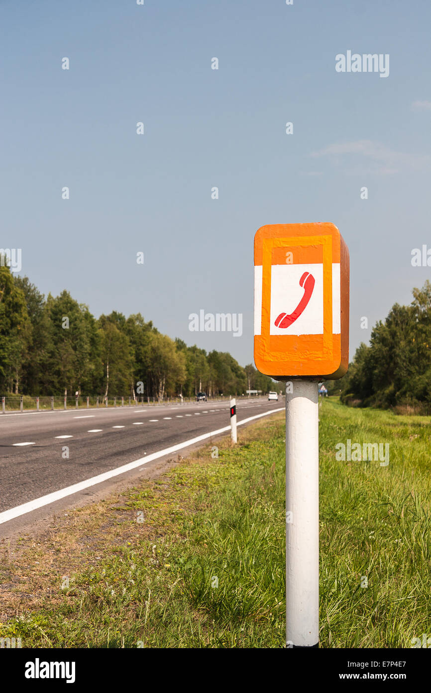 SOS Phone on the road Stock Photo