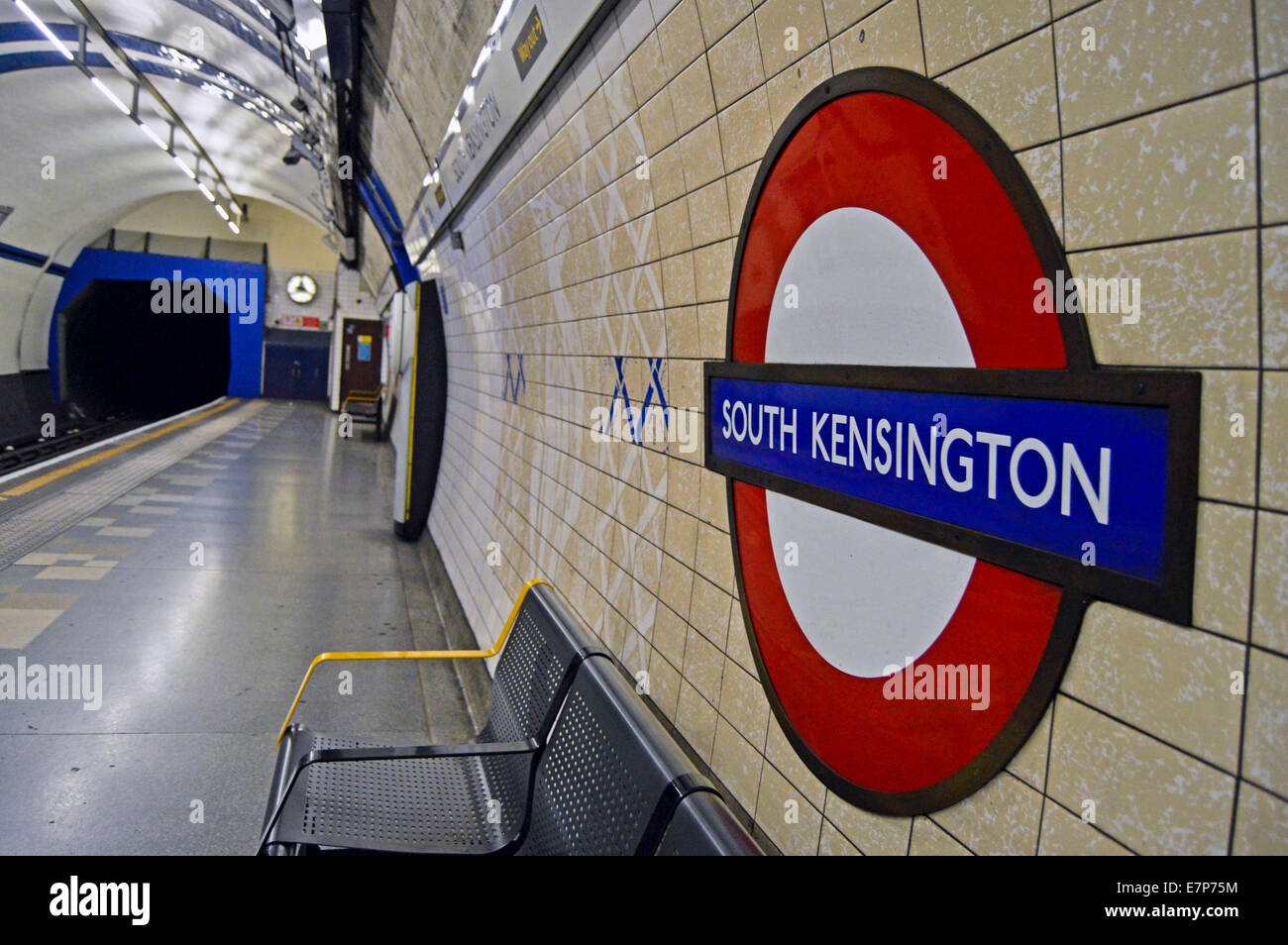 South Kensington Underground Station platform showing roundel, Royal Borough of Kensington and ...