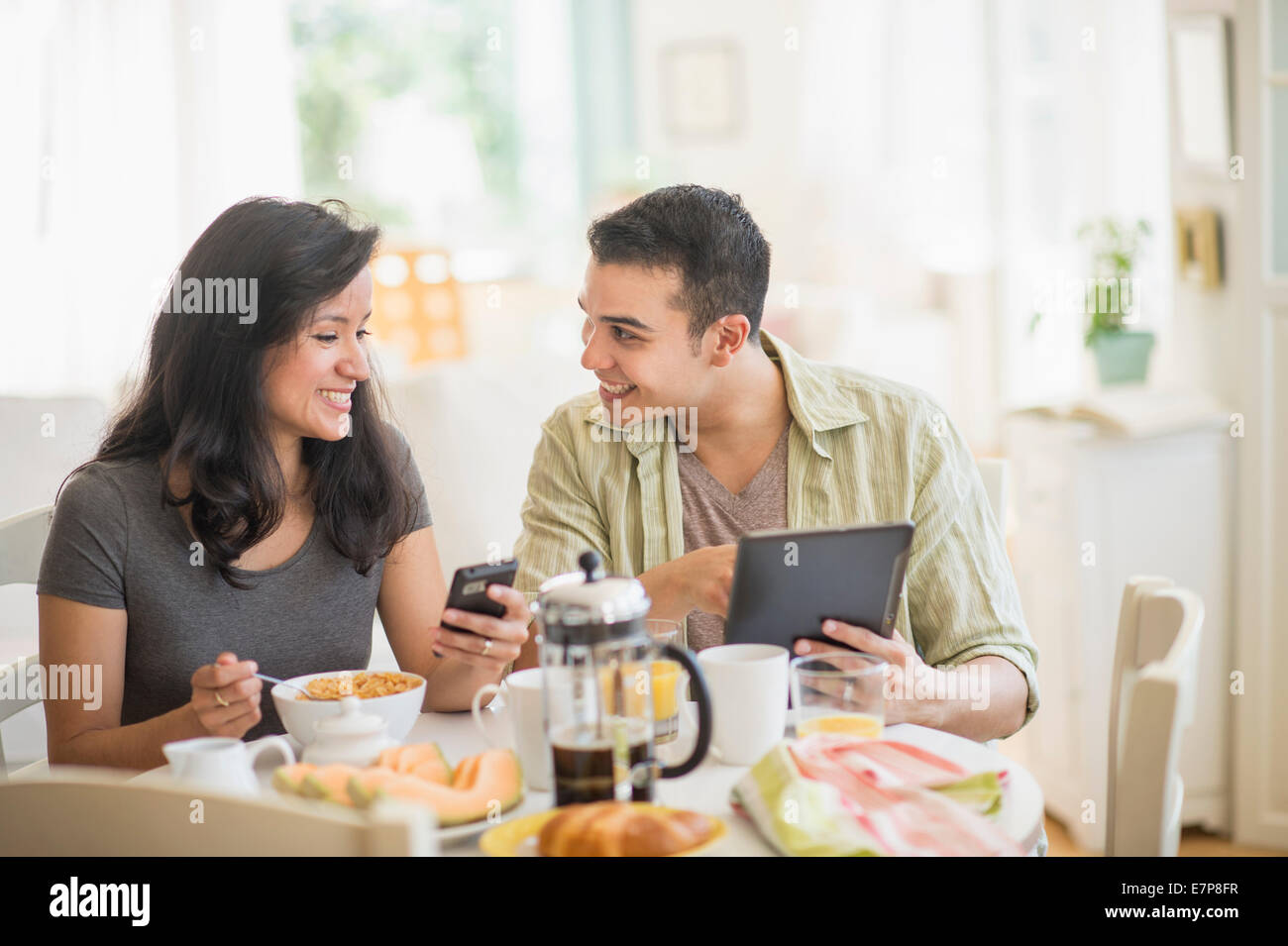 Couple in dining room Stock Photo