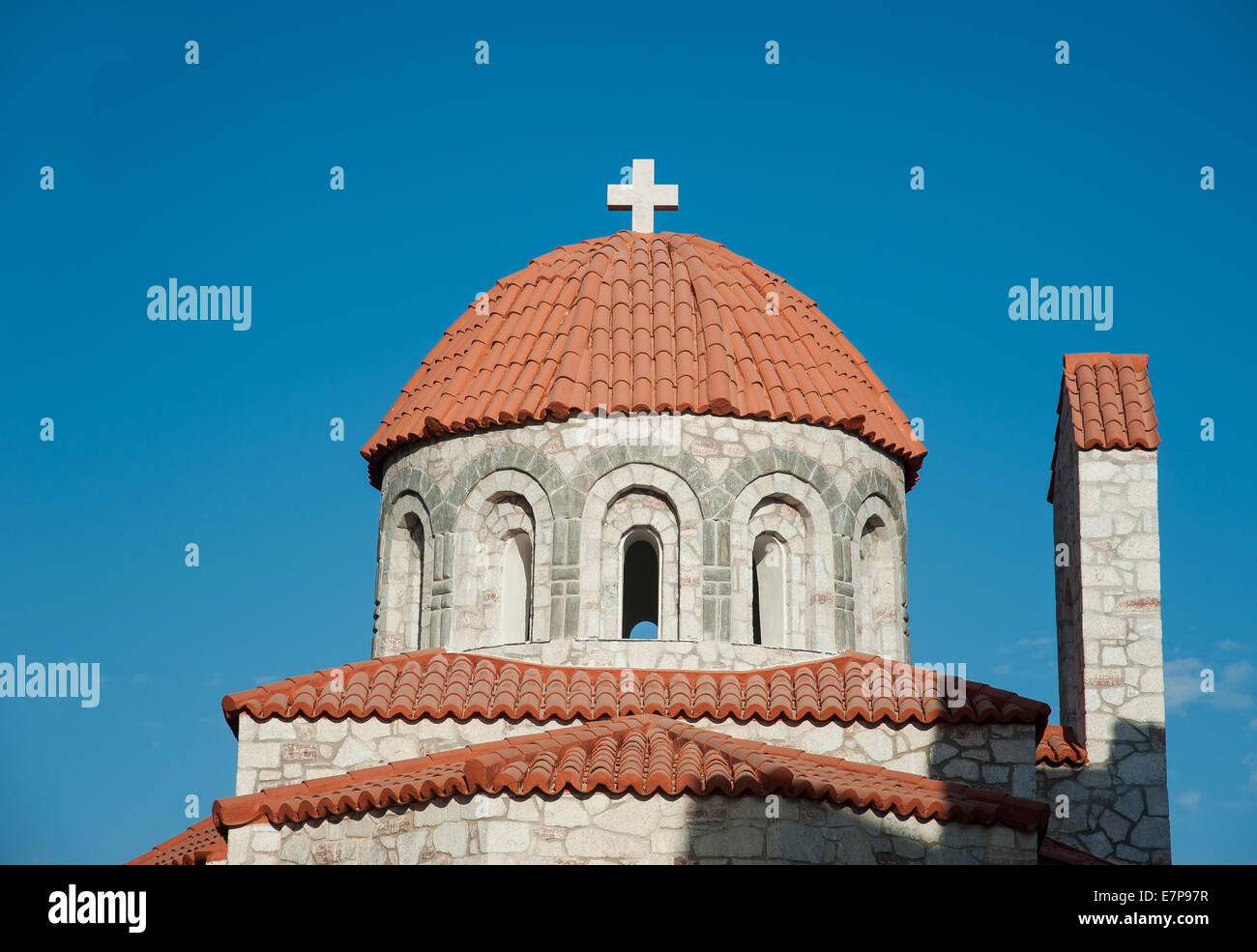 Small church with red tile and blue sky Stock Photo