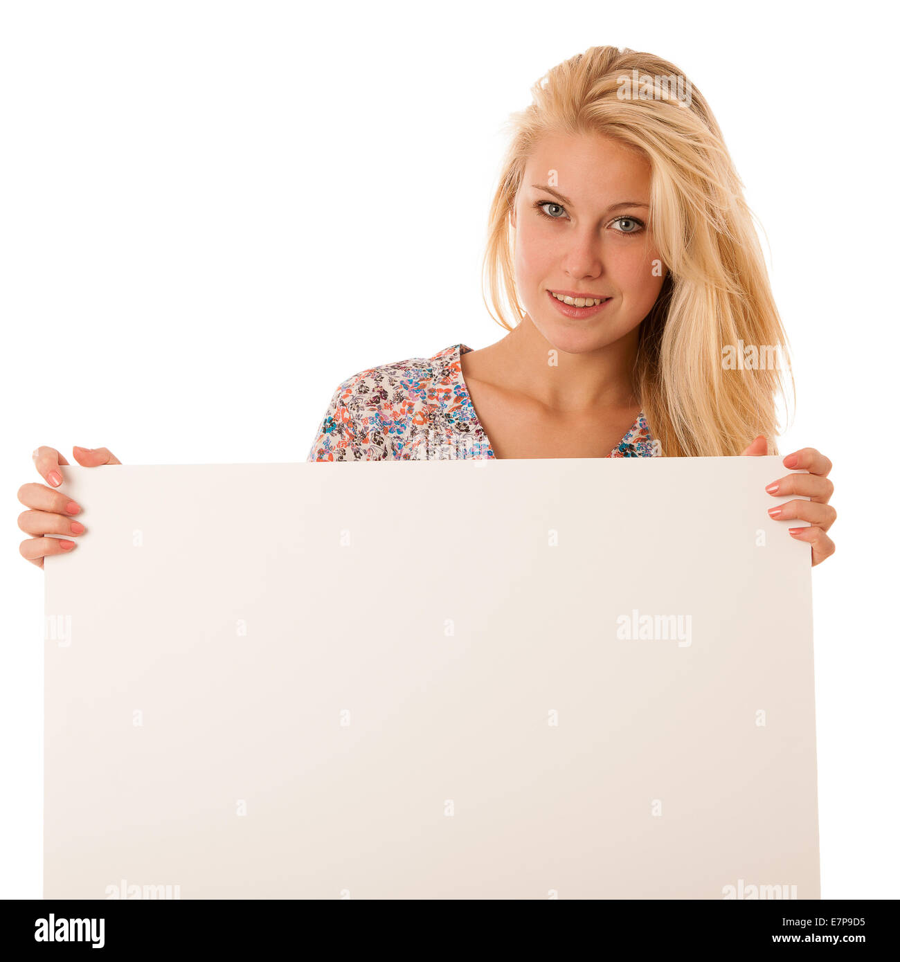 nde woman holding a blank white board in her hands for promotional text or banner isolated over white background Stock Photo