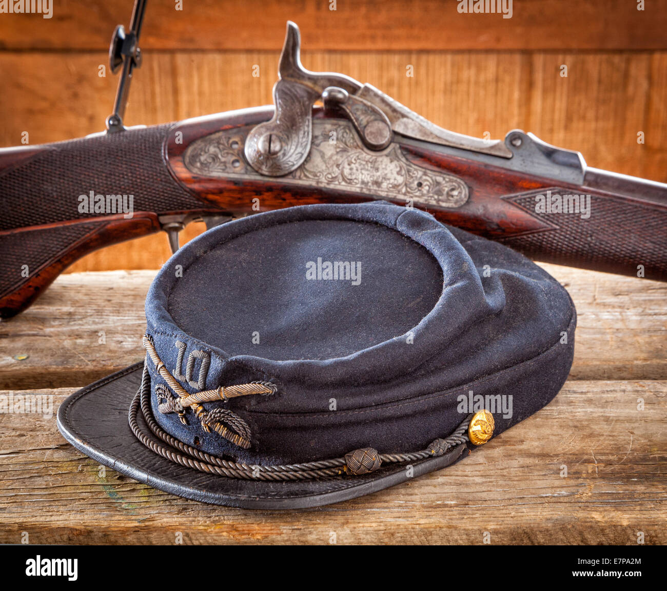 US Army soldier's cap with rifle Stock Photo