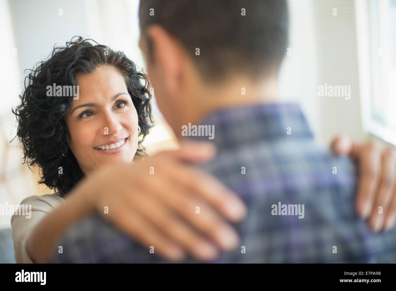 Woman man embracing hi-res stock photography and images - Alamy