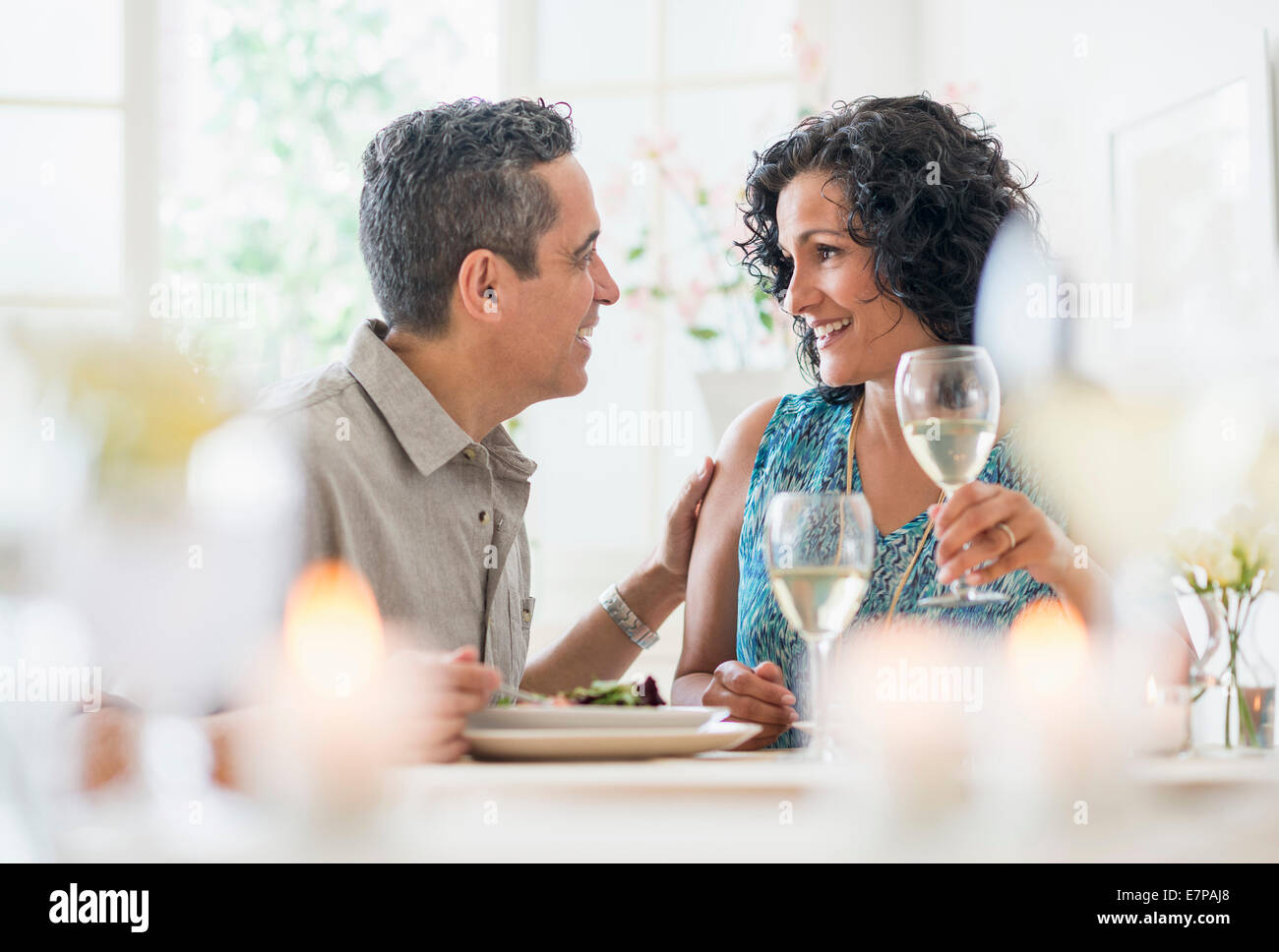 Couple dining in restaurant Stock Photo