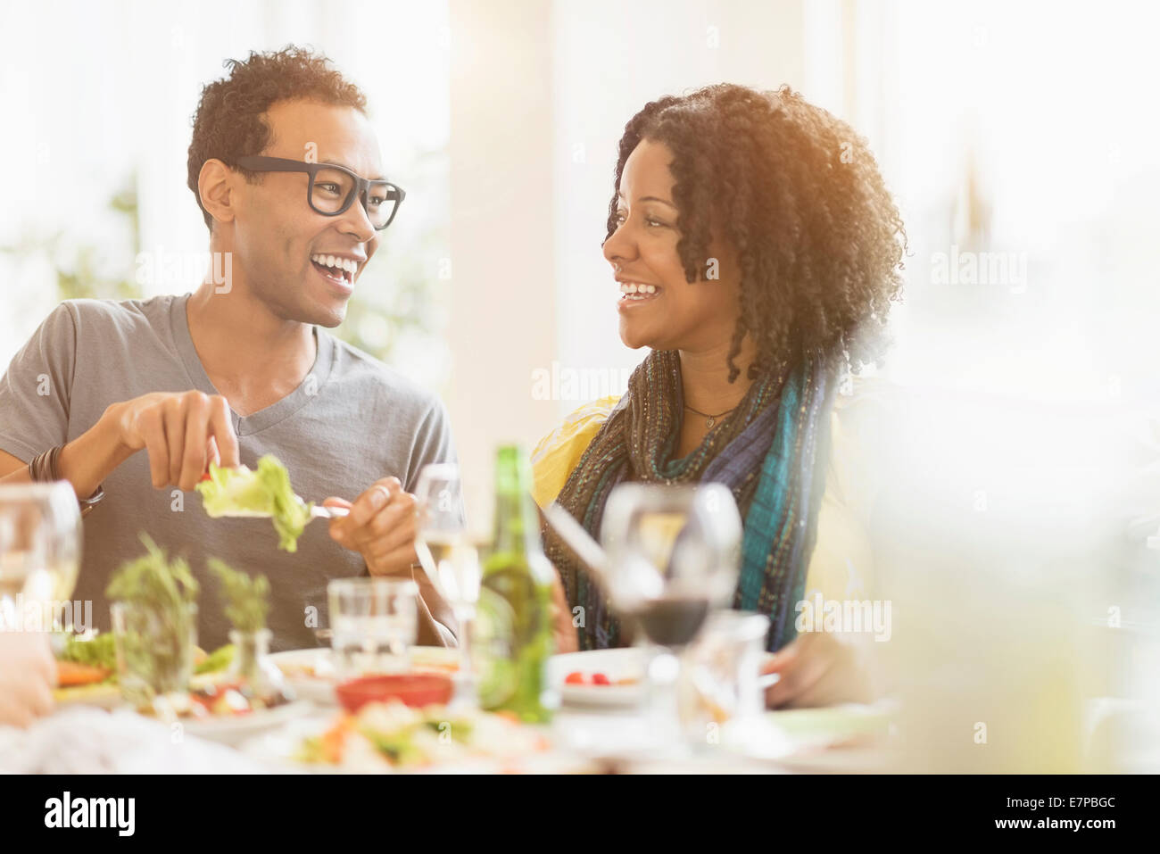 Two friends enjoying dinner party Stock Photo
