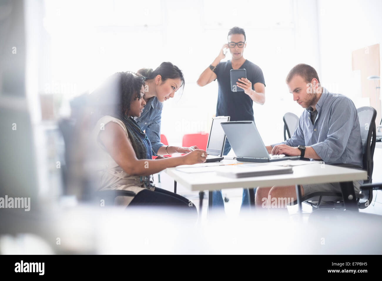 Man woman stand office desk hi-res stock photography and images - Alamy