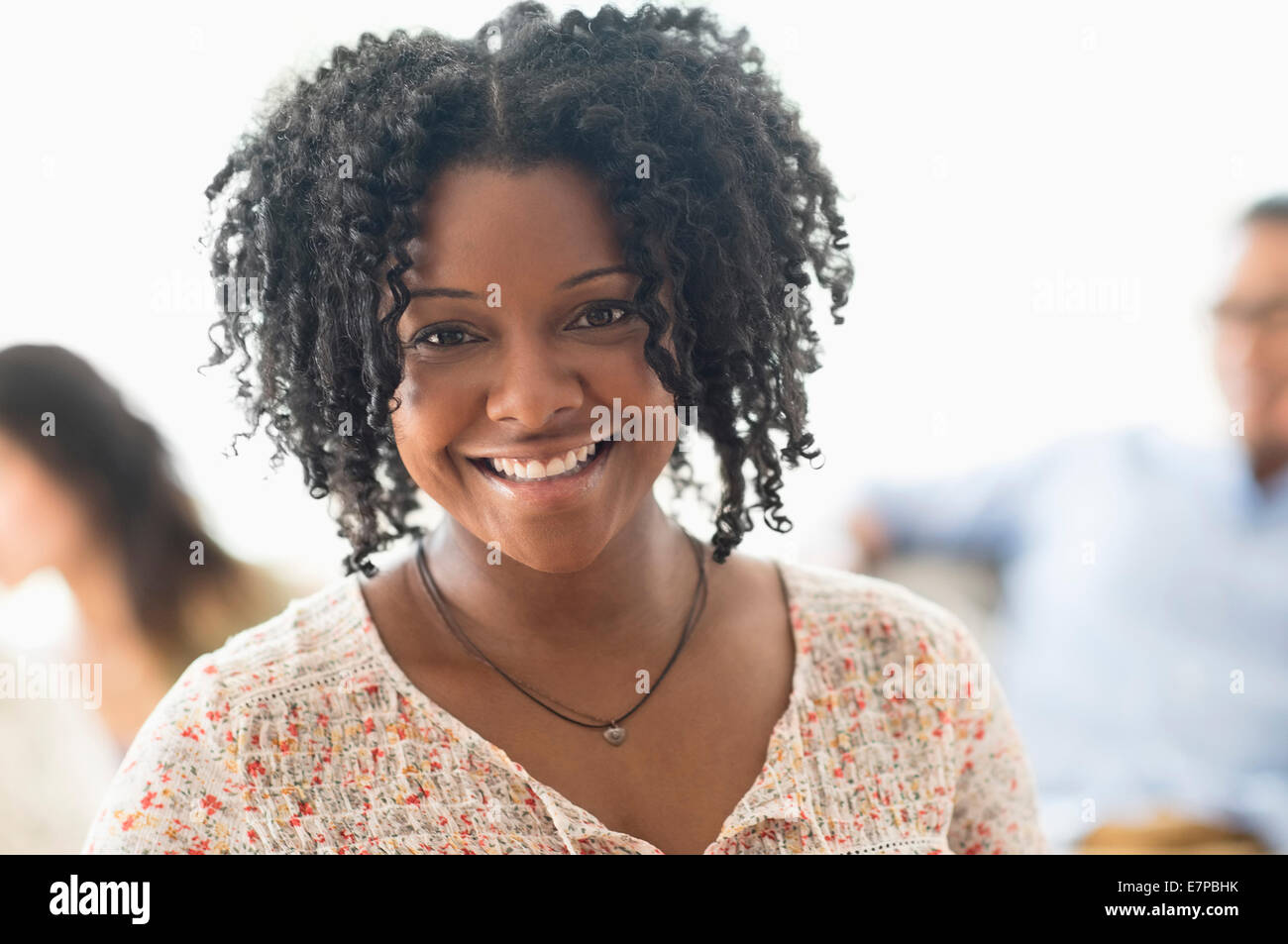Portrait of smiling woman Stock Photo