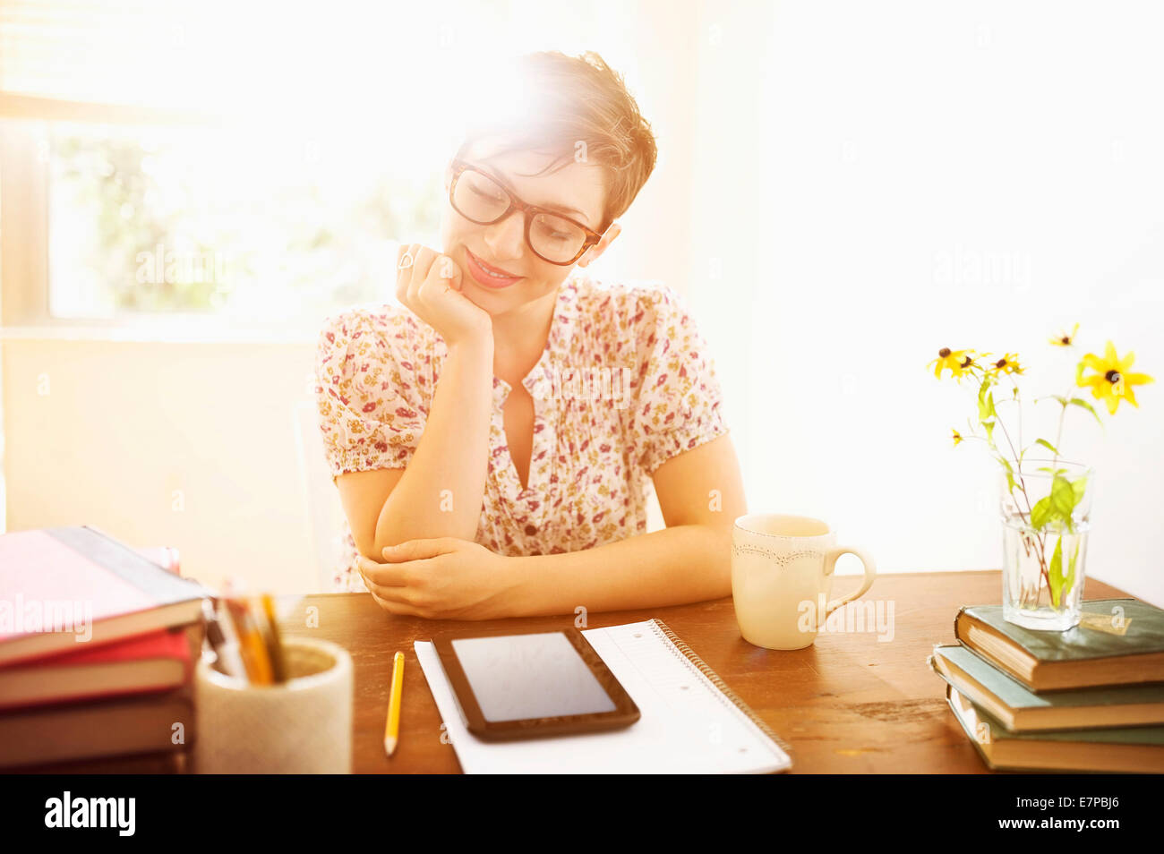 Young woman working in home office Stock Photo