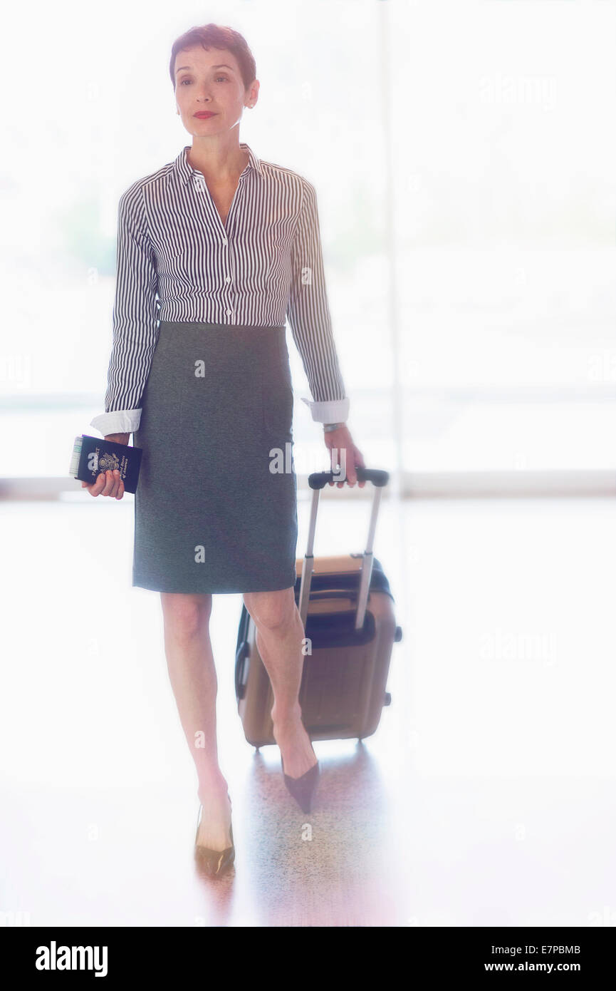 Woman in short skirt walking hi-res stock photography and images - Alamy