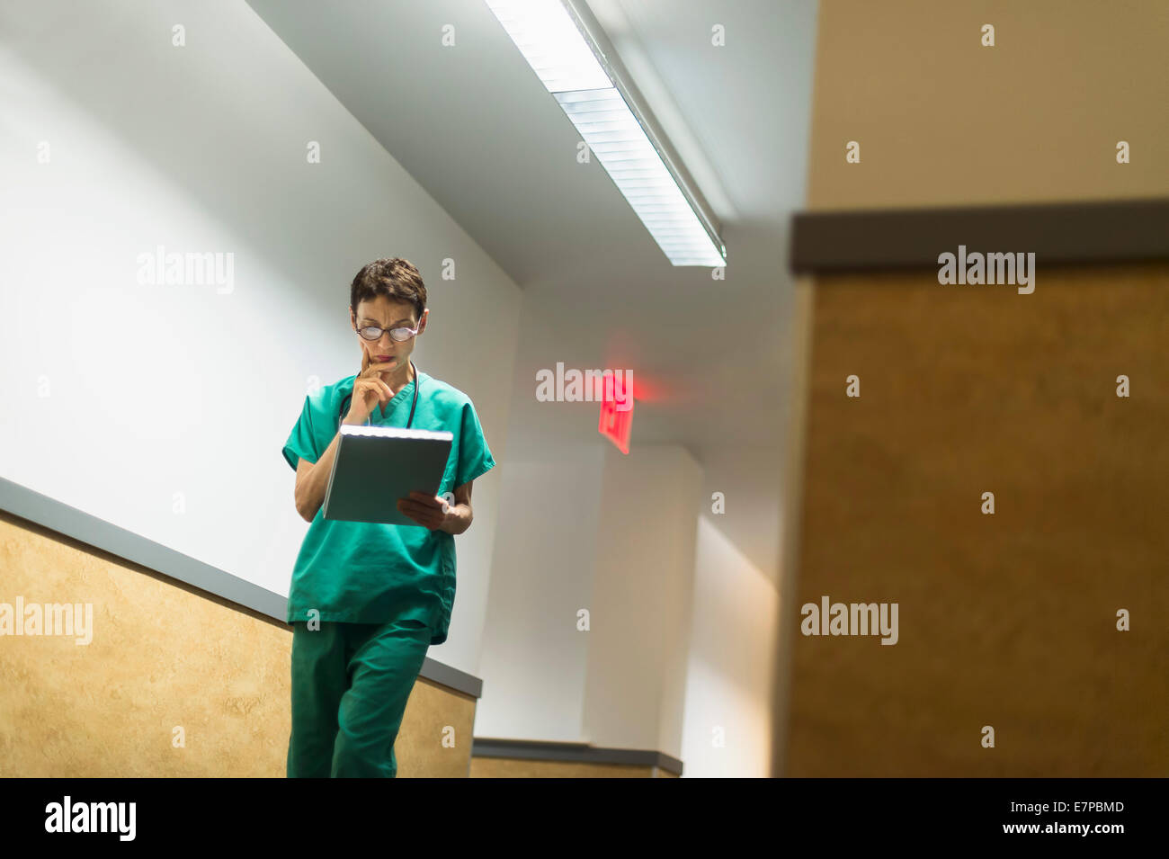 Female doctor in hospital corridor Stock Photo