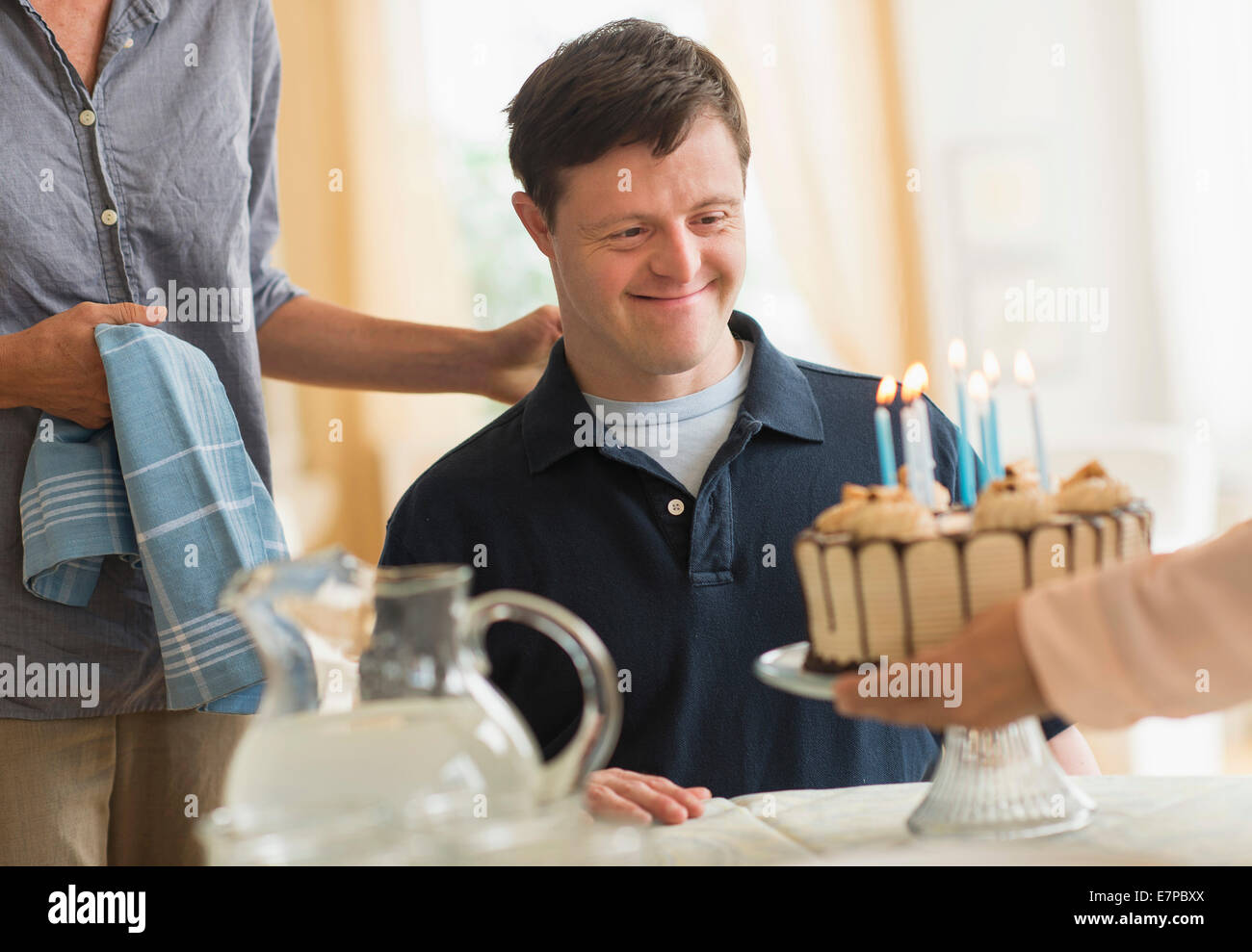 Man with down syndrome celebrating birthday Stock Photo