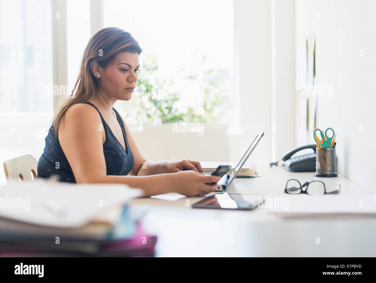 Woman working in home office Stock Photo - Alamy