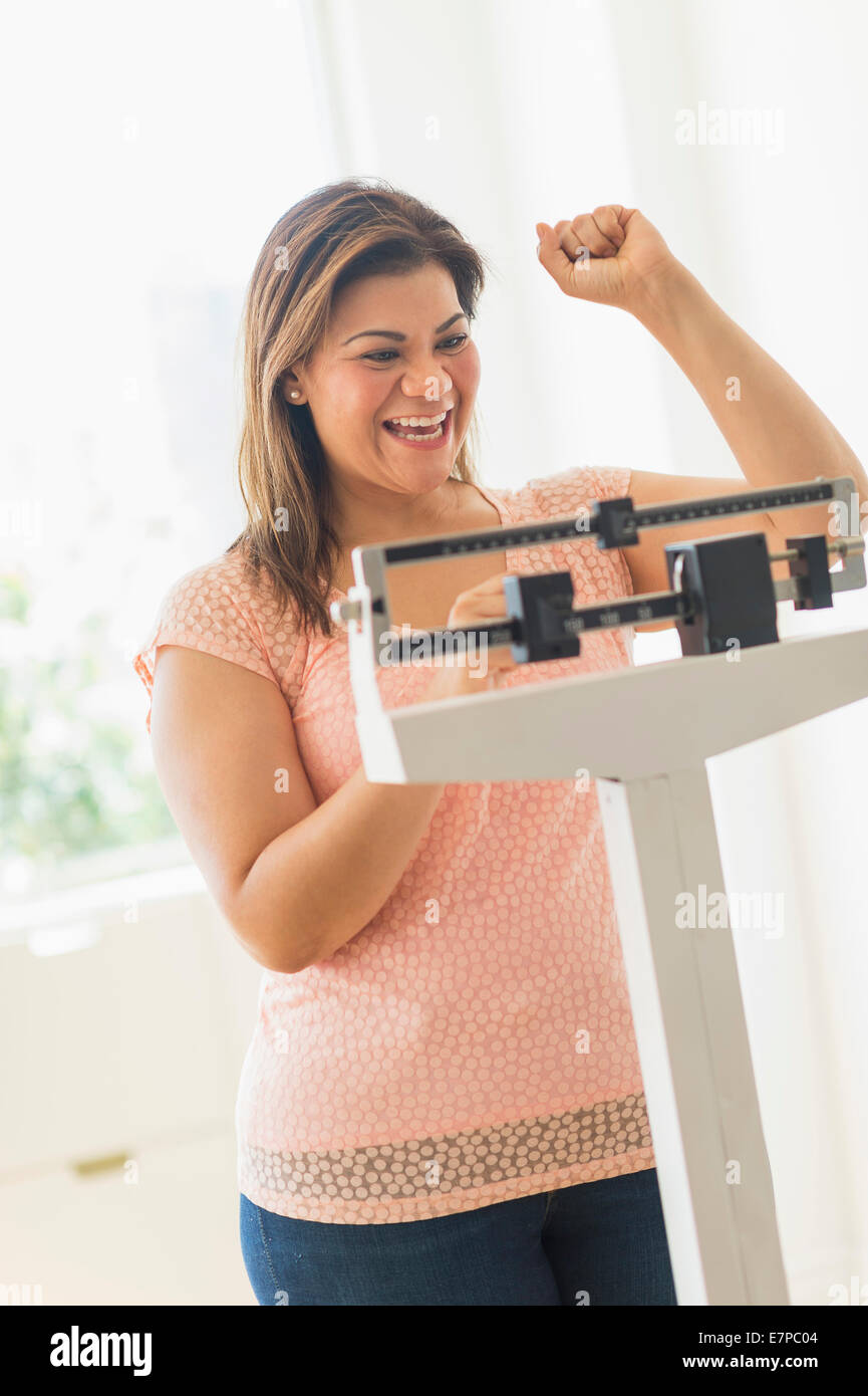 Weight loss scale celebrating hi-res stock photography and images - Alamy