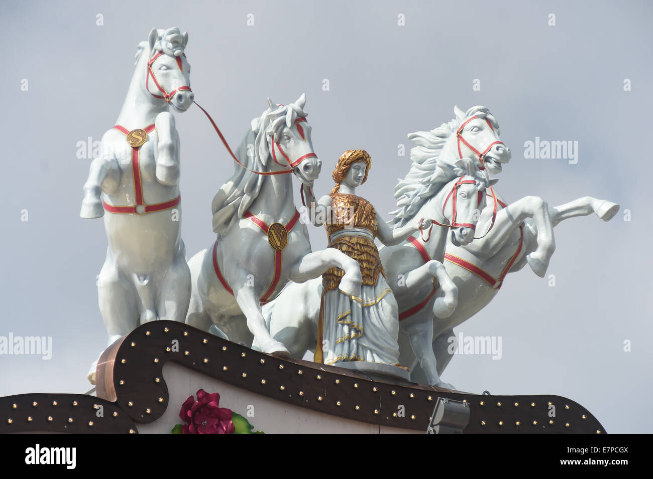 Munich, Germany. 22nd Sep, 2014. Horse statues are pictured on the roof of the Marstall festival tent at Oktoberfest in Munich, Germany, 22 September 2014. Horses are closesly connected to horses. Oktoberfest is the world's largest funfair and it grew out of horse races held in honour of the Royal bridal couple Ludwig of Bavaria and Therese of Saxe-Hildburghausen. Photo: FELIX HOERHAGER/DPA/Alamy Live News Stock Photo