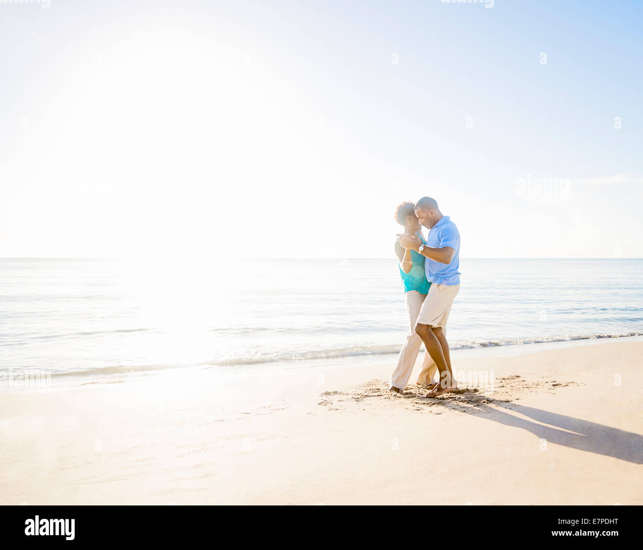 Woman dancing on beach sunny hi-res stock photography and images - Alamy