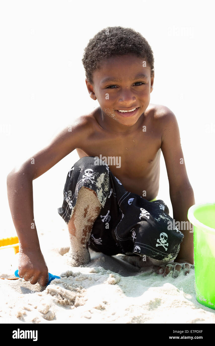 Portrait of boy (4-5) playing on beach Stock Photo