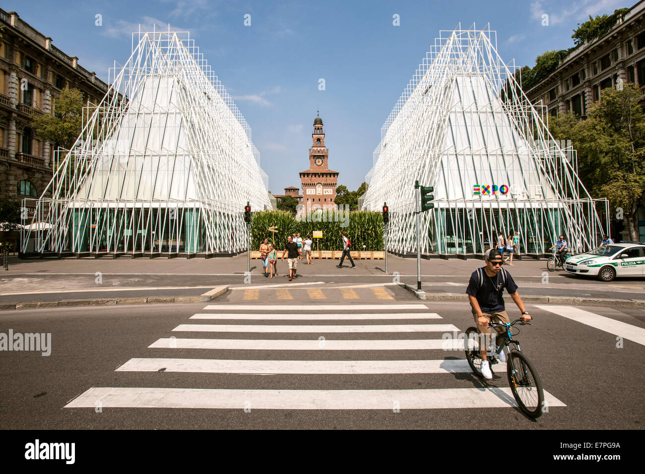 Milan, Expo 2015, EXPOGATE, Fair Universal, Exposition, Sforzesco castle, city,  gate, infopoint, pedestrian crossing, cyclist Stock Photo