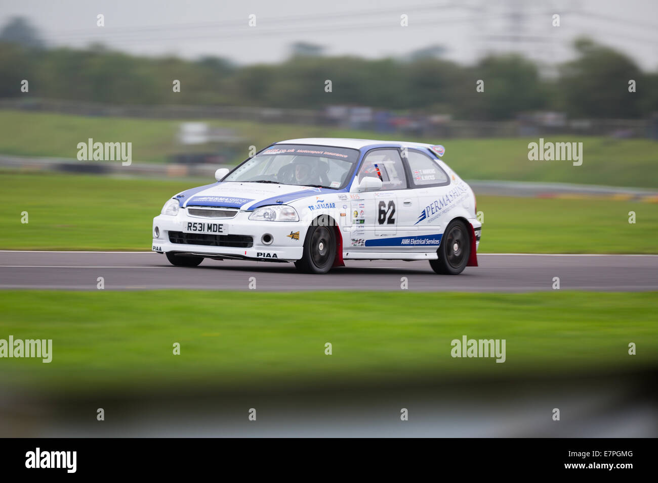 A rally car takes to the track at Rallyday at Castle Combe Stock Photo ...