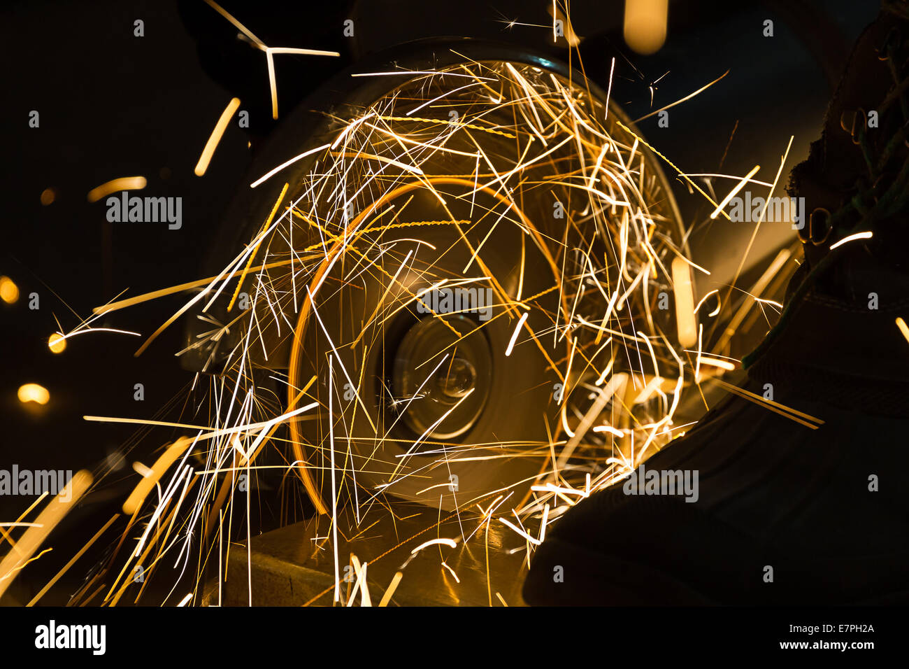 Sharp Iron sharpening and cutting of iron by abrasive disk machine Stock Photo - Alamy