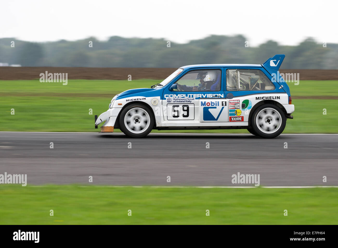 A rally car takes to the track at Rallyday at Castle Combe Stock Photo ...