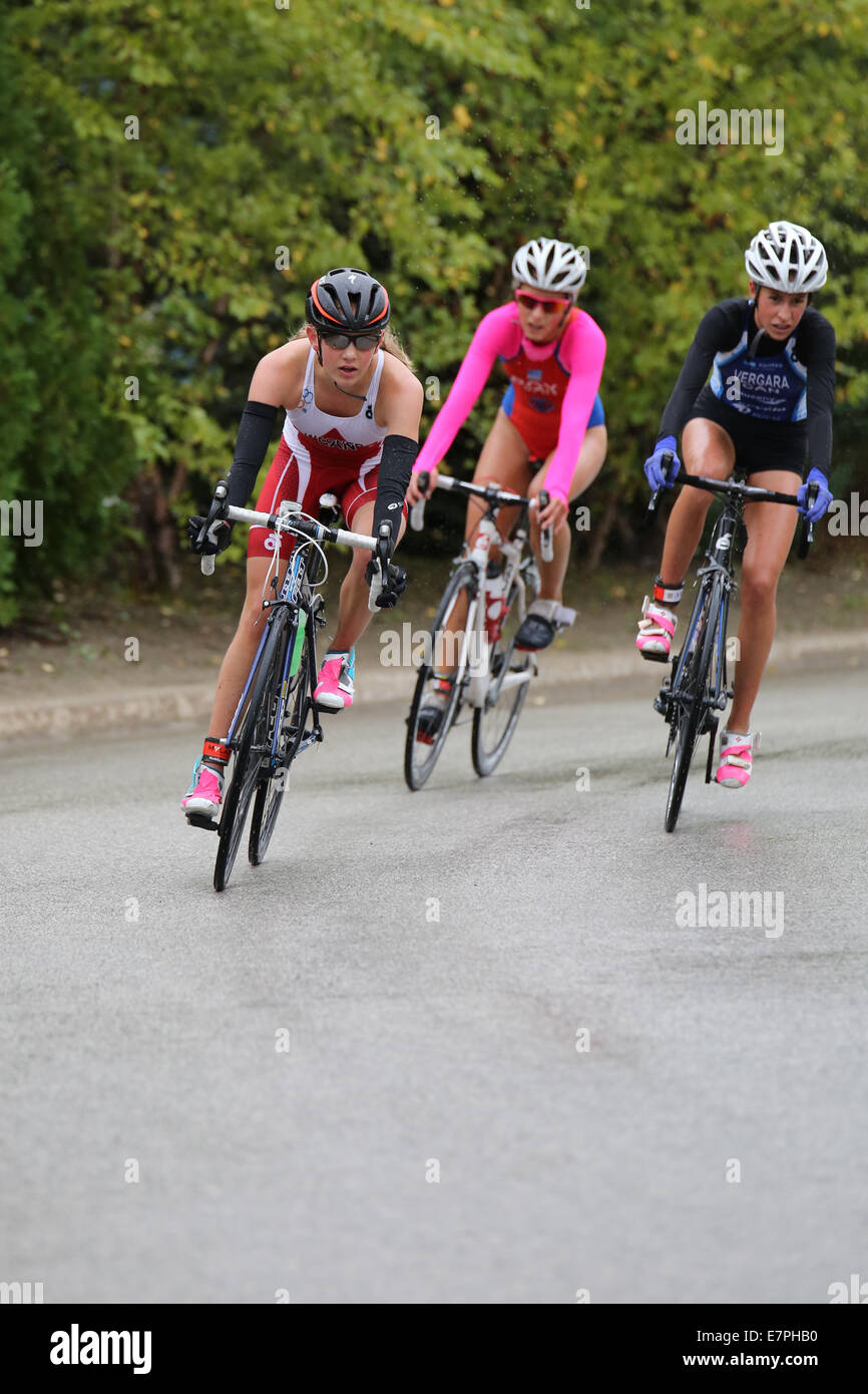 three female cyclists competition race Stock Photo - Alamy