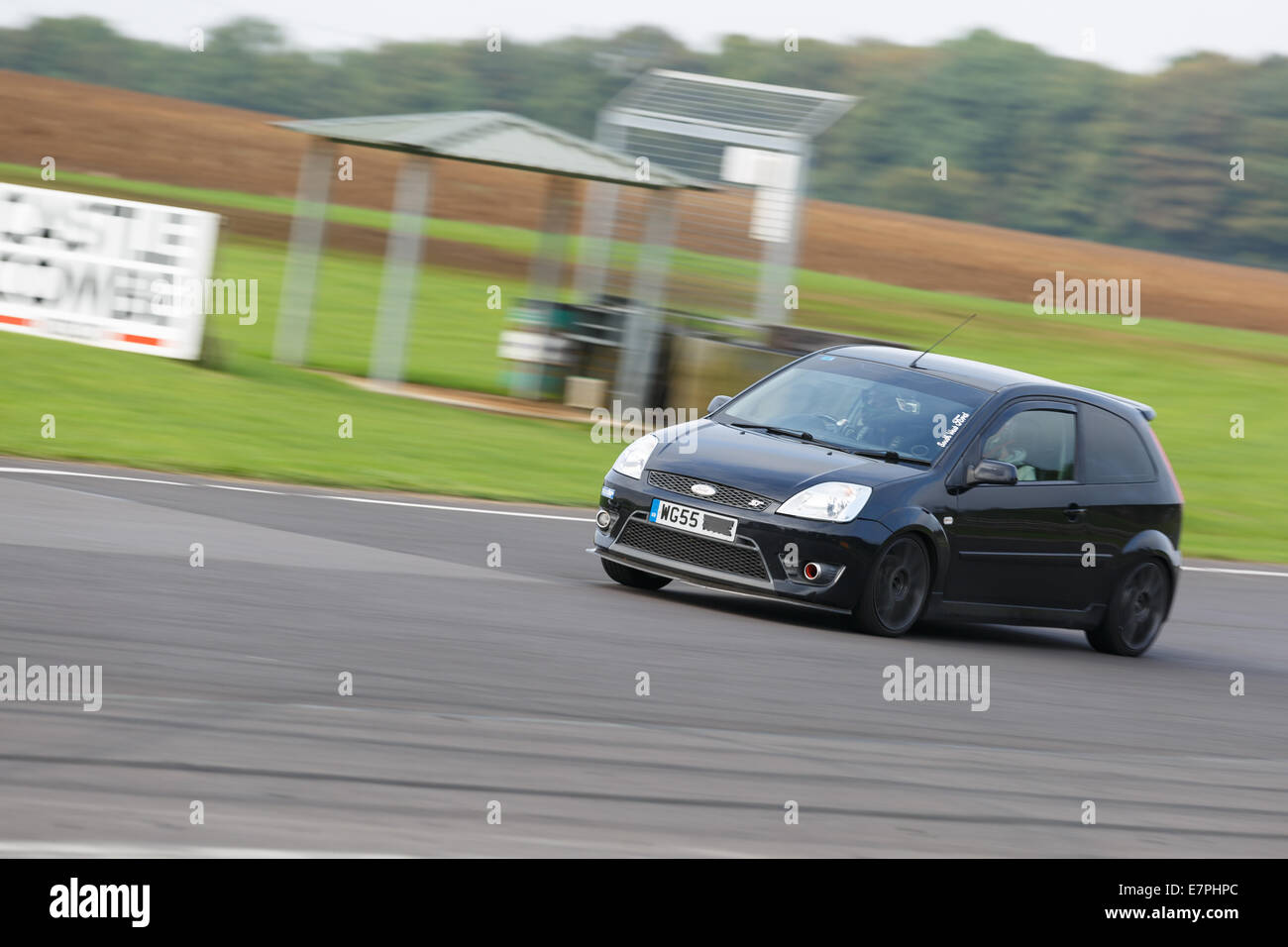 A rally car takes to the track at Rallyday at Castle Combe Stock Photo ...