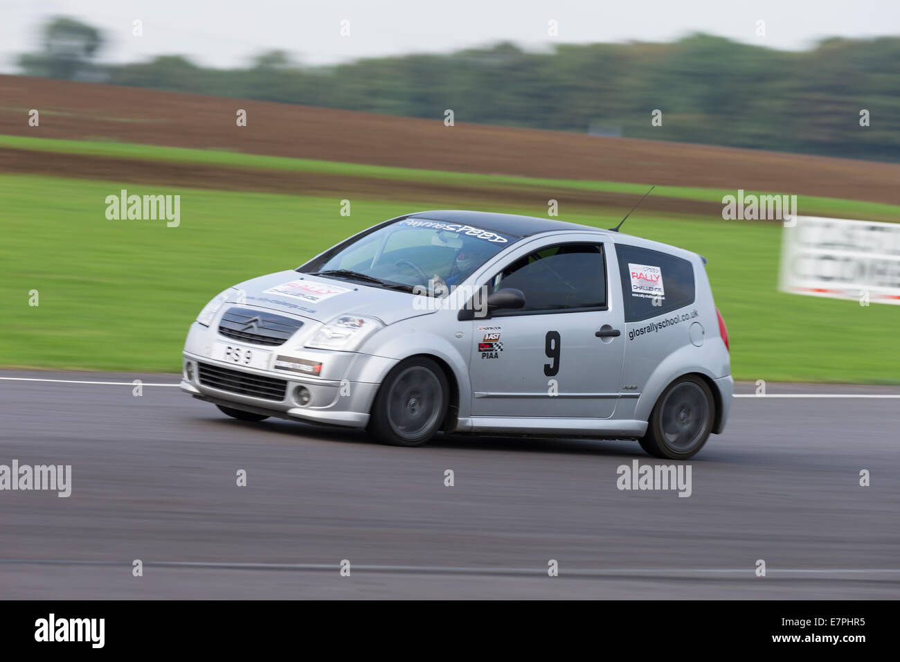 A rally car takes to the track at Rallyday at Castle Combe Stock Photo ...